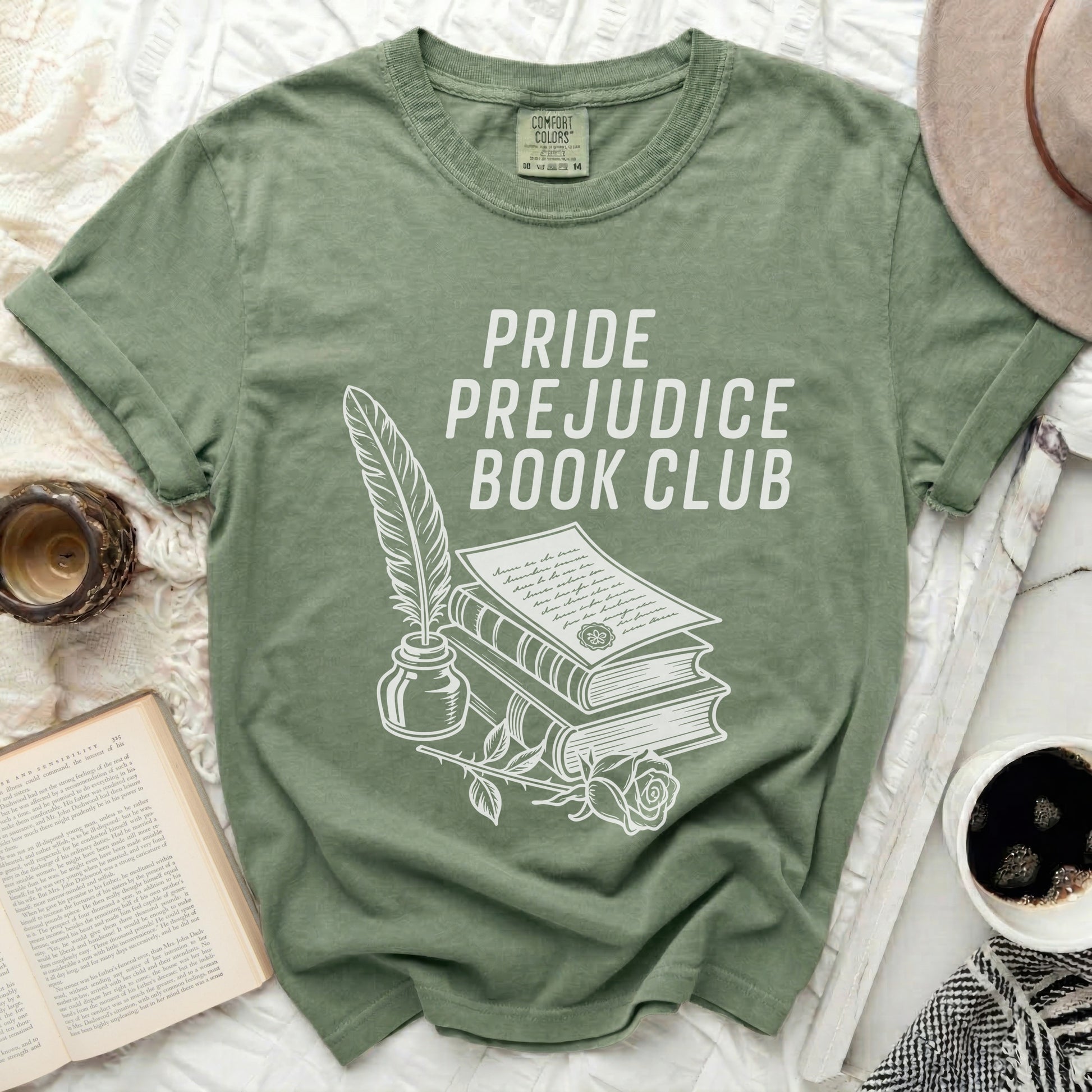 Green t-shirt with "Pride Prejudice Book Club" and book illustration.