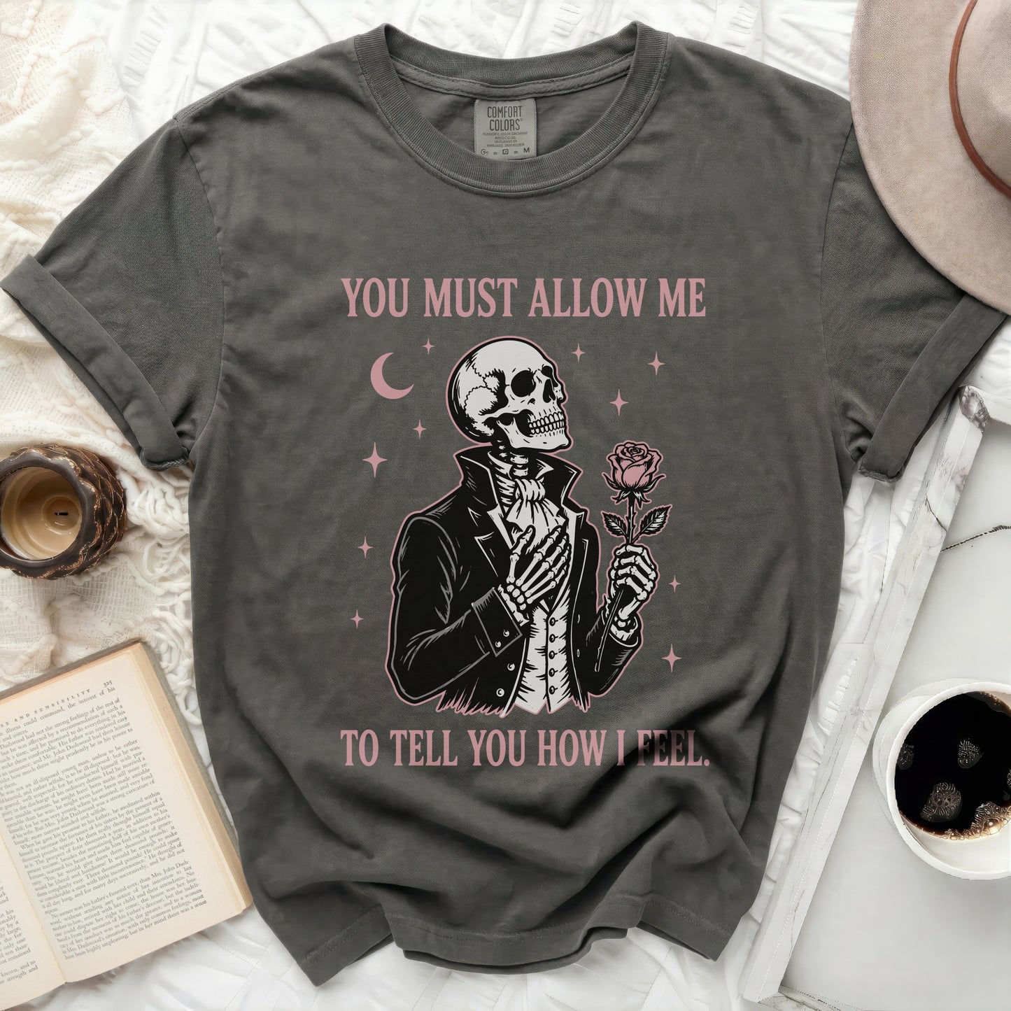 Skeleton in a suit holding a rose, text "YOU MUST ALLOW ME TO TELL YOU HOW I FEEL."