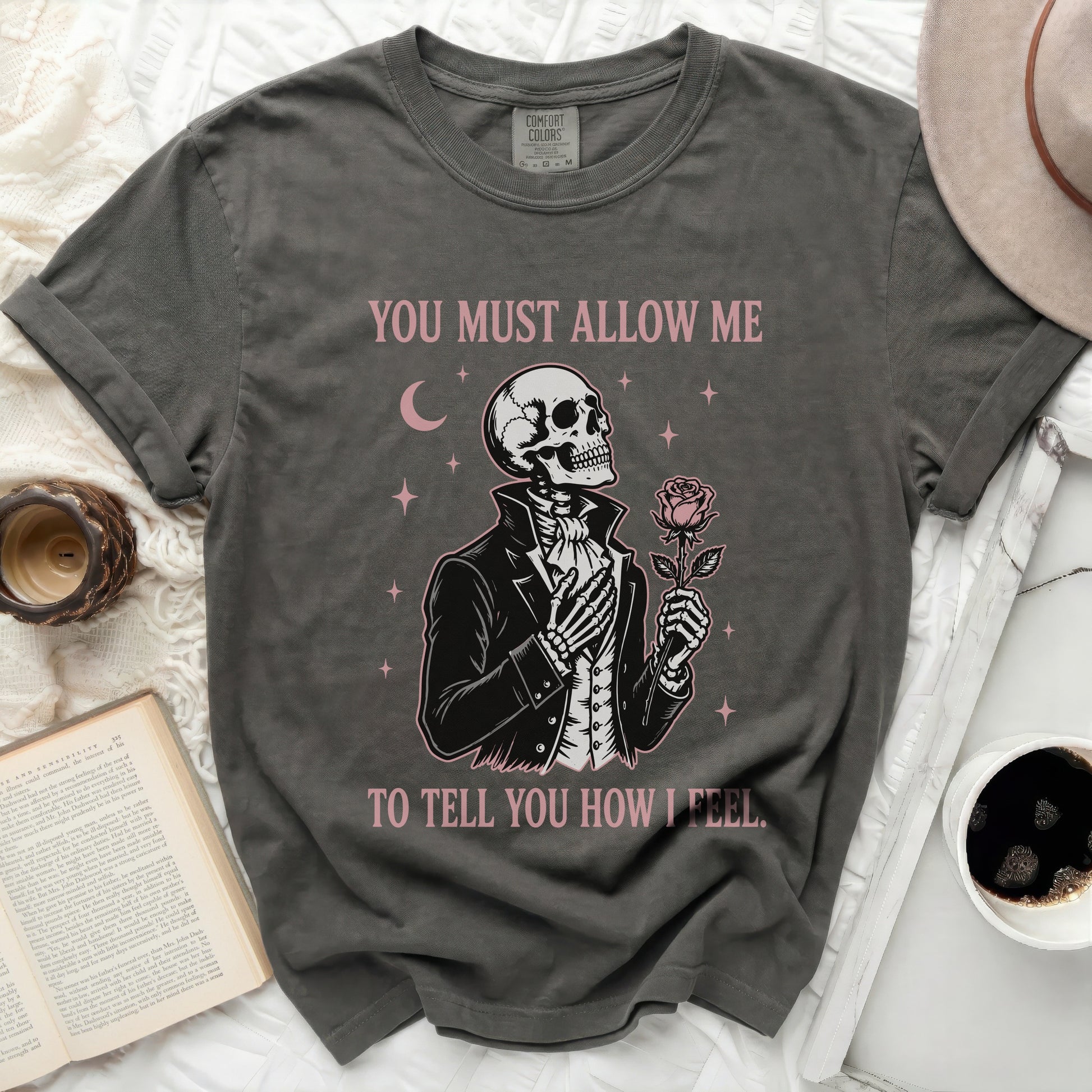 Skeleton in a suit holding a rose, text "YOU MUST ALLOW ME TO TELL YOU HOW I FEEL."