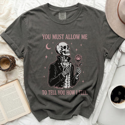 Skeleton in a suit holding a rose, text "YOU MUST ALLOW ME TO TELL YOU HOW I FEEL."