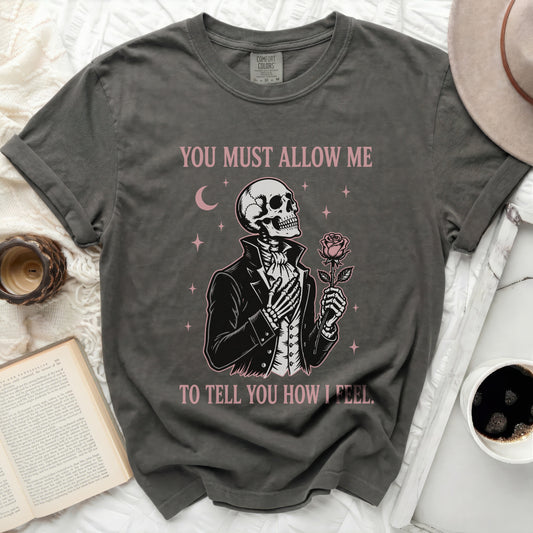 Skeleton in a suit holding a rose, text "YOU MUST ALLOW ME TO TELL YOU HOW I FEEL."