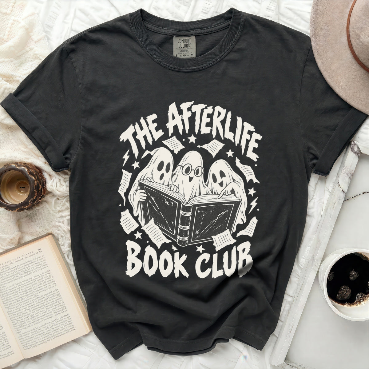 Black t-shirt with "The Afterlife Book Club" graphic featuring ghosts reading.