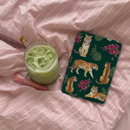 Ipad case with multiple tigers and floral pattern on green background.
