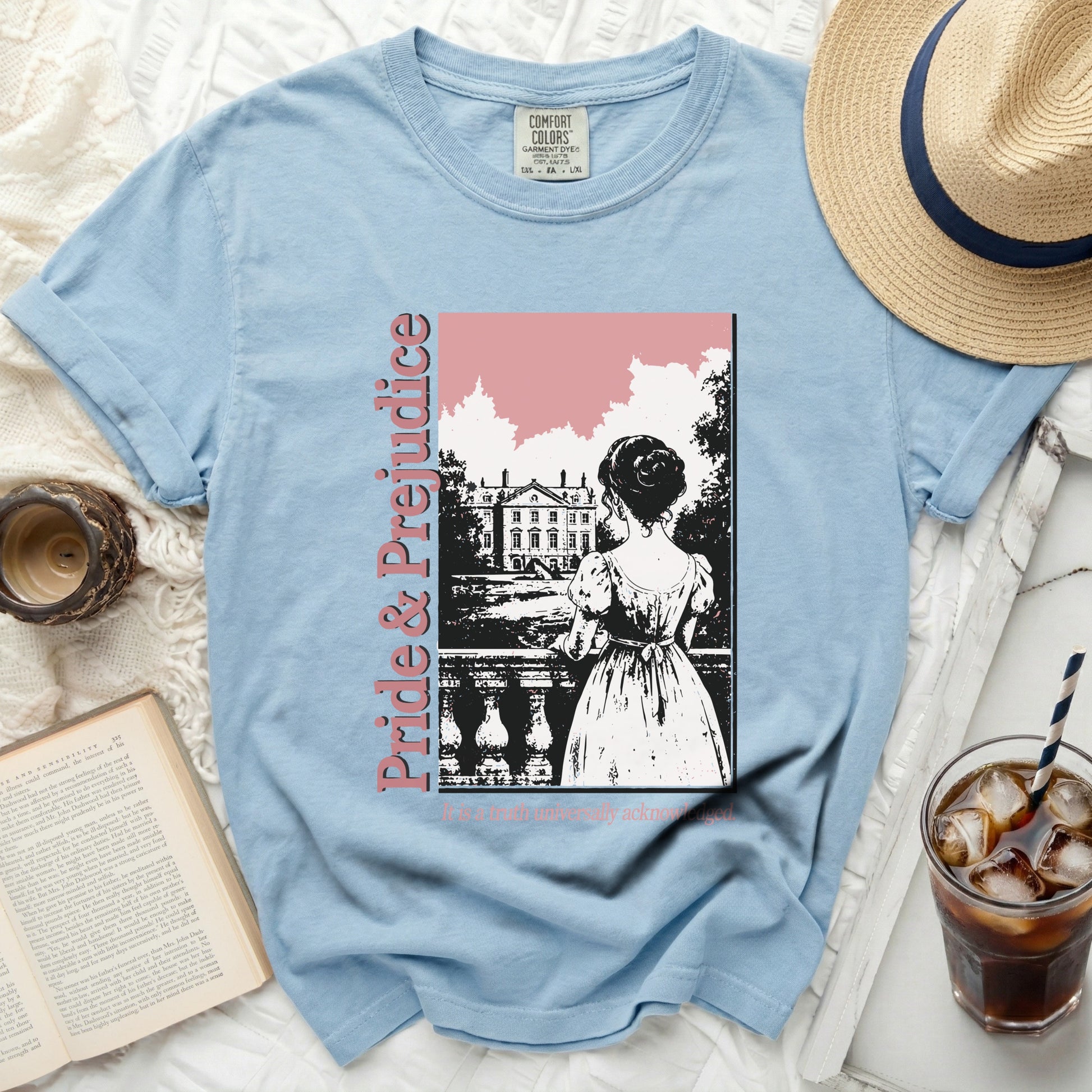 Light blue t-shirt with "Pride & Prejudice" book cover graphic.