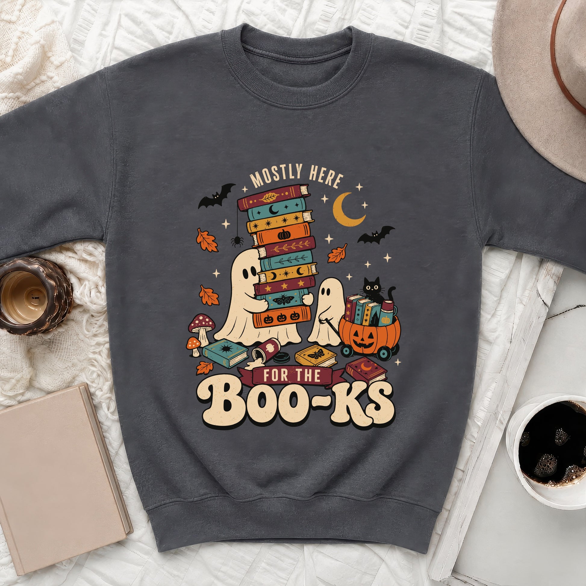 Ghosts and black cat with books and pumpkin, "Mostly Here for the Boo-ks" text.