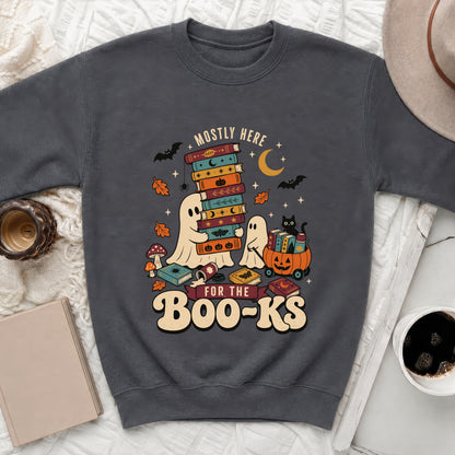 Ghosts and black cat with books and pumpkin, "Mostly Here for the Boo-ks" text.