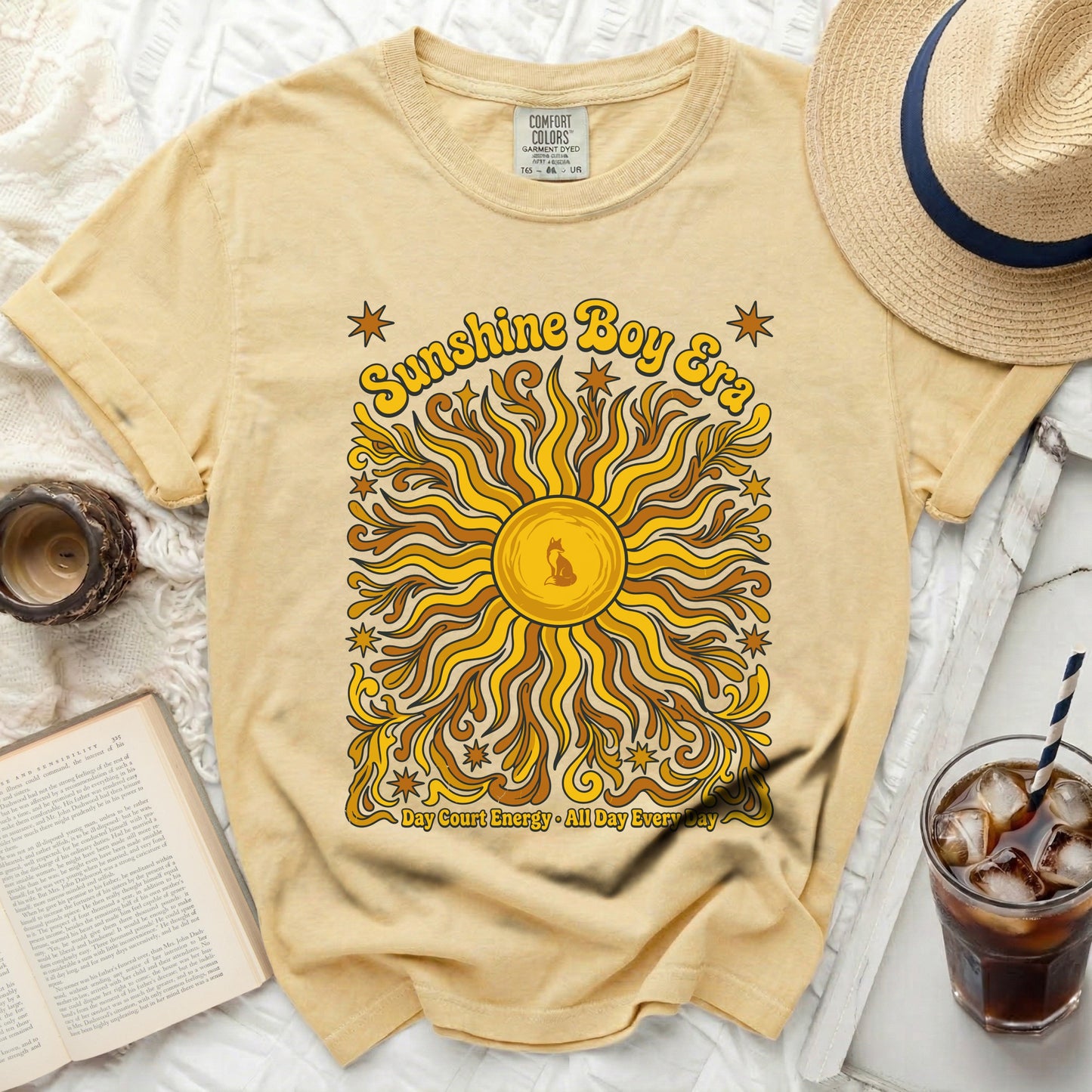 Yellow t-shirt with "Sunshine Boy Era" and a sun graphic.