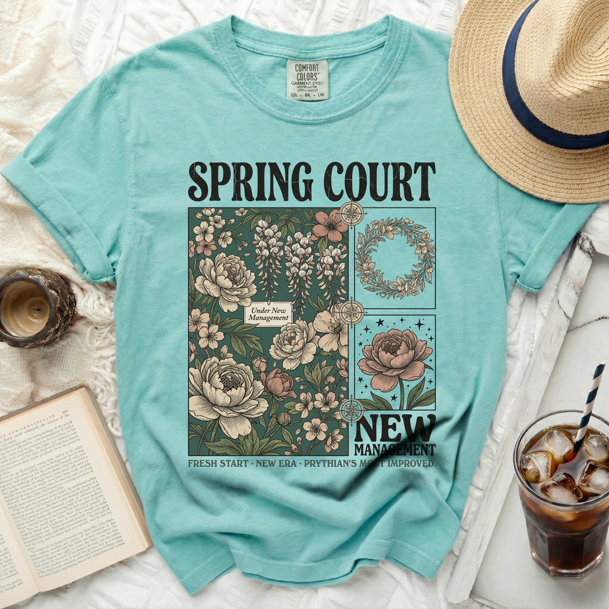 Teal t-shirt with "Spring Court New Management" floral graphic.