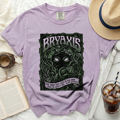 Purple t-shirt with "BRYAXIS THE THING THAT LIVES IN THE DARK" graphic.