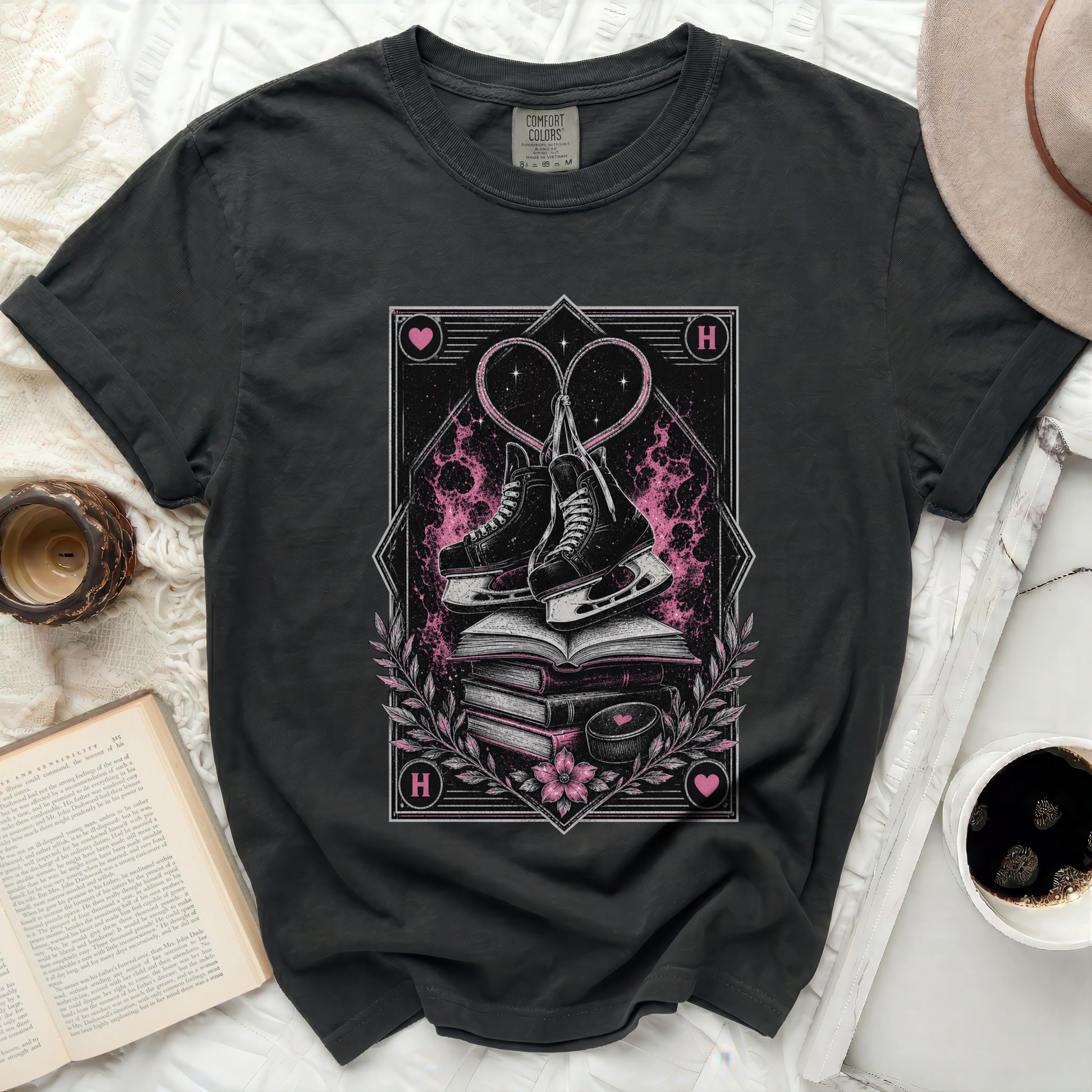 Skates and hearts graphic on a dark Comfort Colors t-shirt.