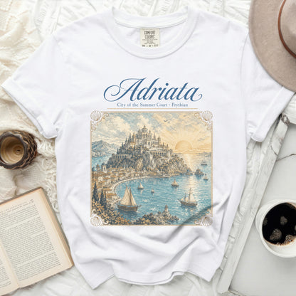 White t-shirt with a vintage graphic of "Adriata" and a coastal city.