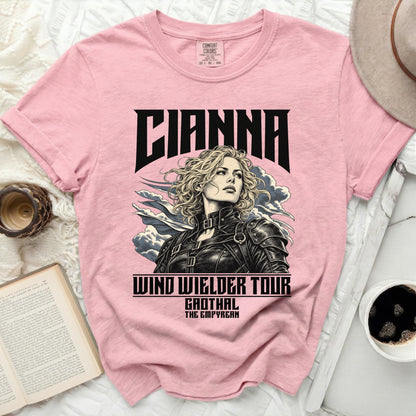 Pink t-shirt with black graphic of "CIANNA", "WIND WIELDER TOUR", "GAOTHAL THE EMPYREAN".