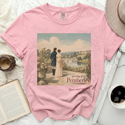 Pink t-shirt with "Greetings from Pemberley" artwork and a couple with a castle.