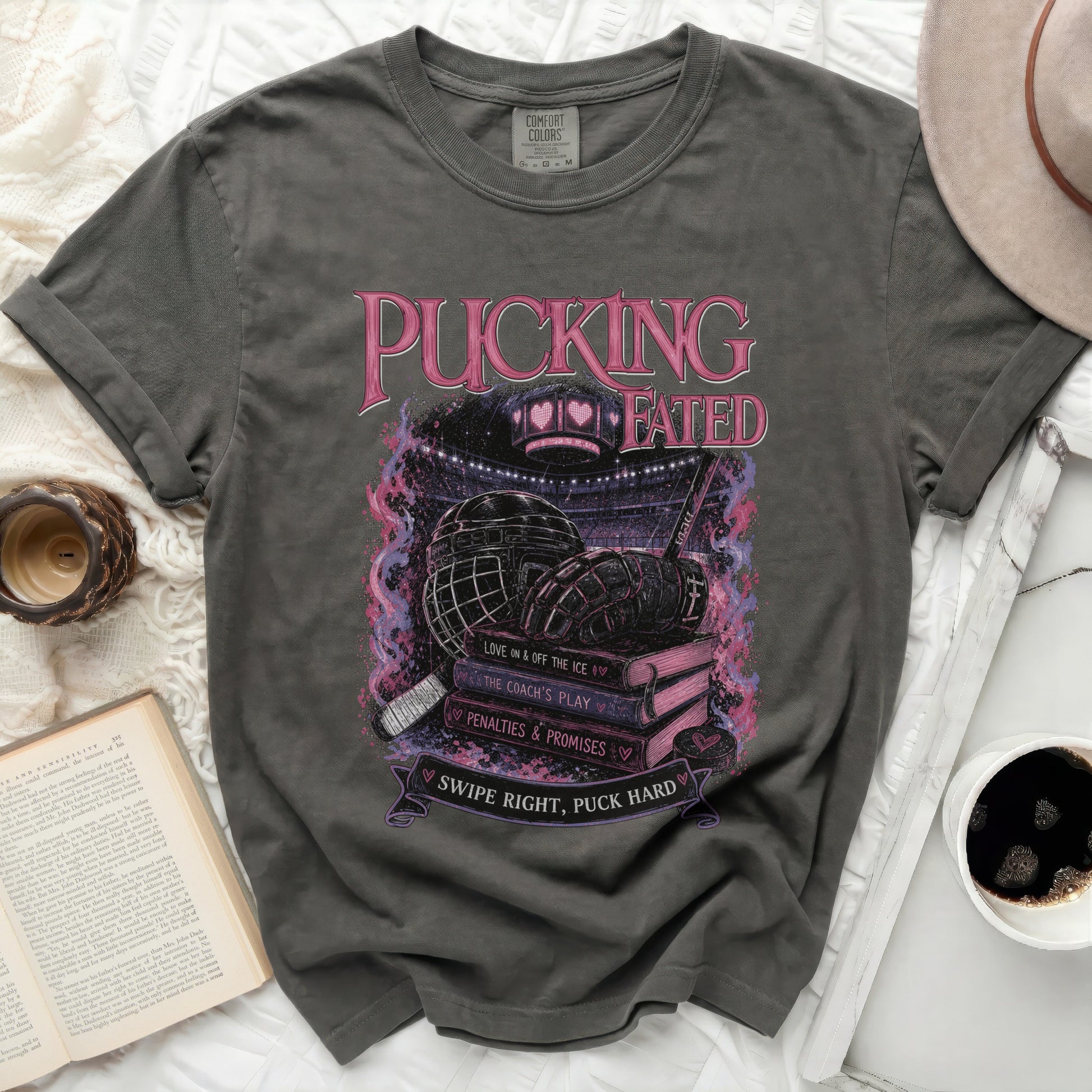 Dark gray t-shirt with "Pucking Fated" and hockey graphics.