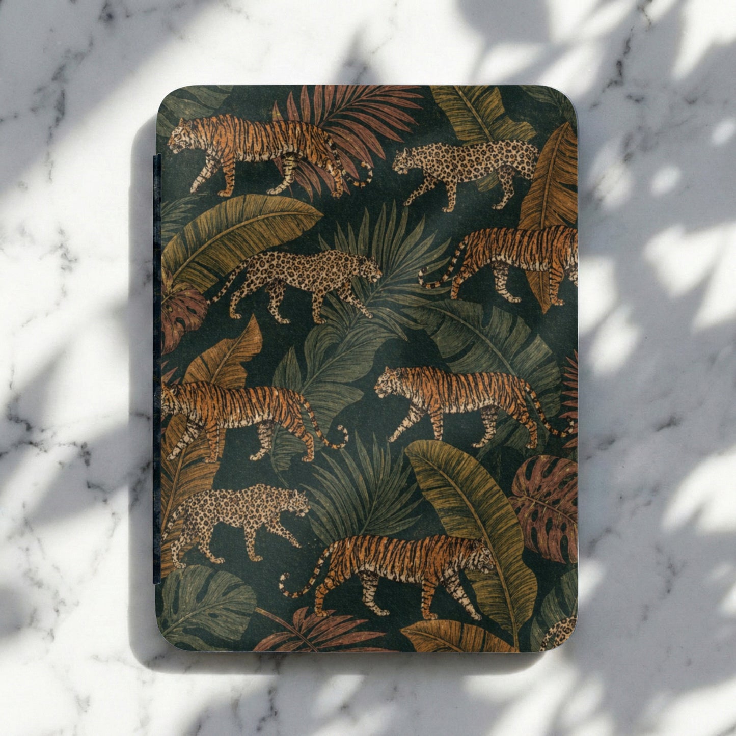 Journal with a dark green tropical print featuring tigers and leopards.