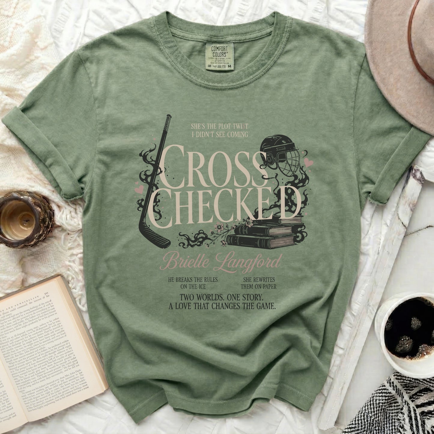Green t-shirt with "Cross Checked Brielle Langford" text and hockey imagery.