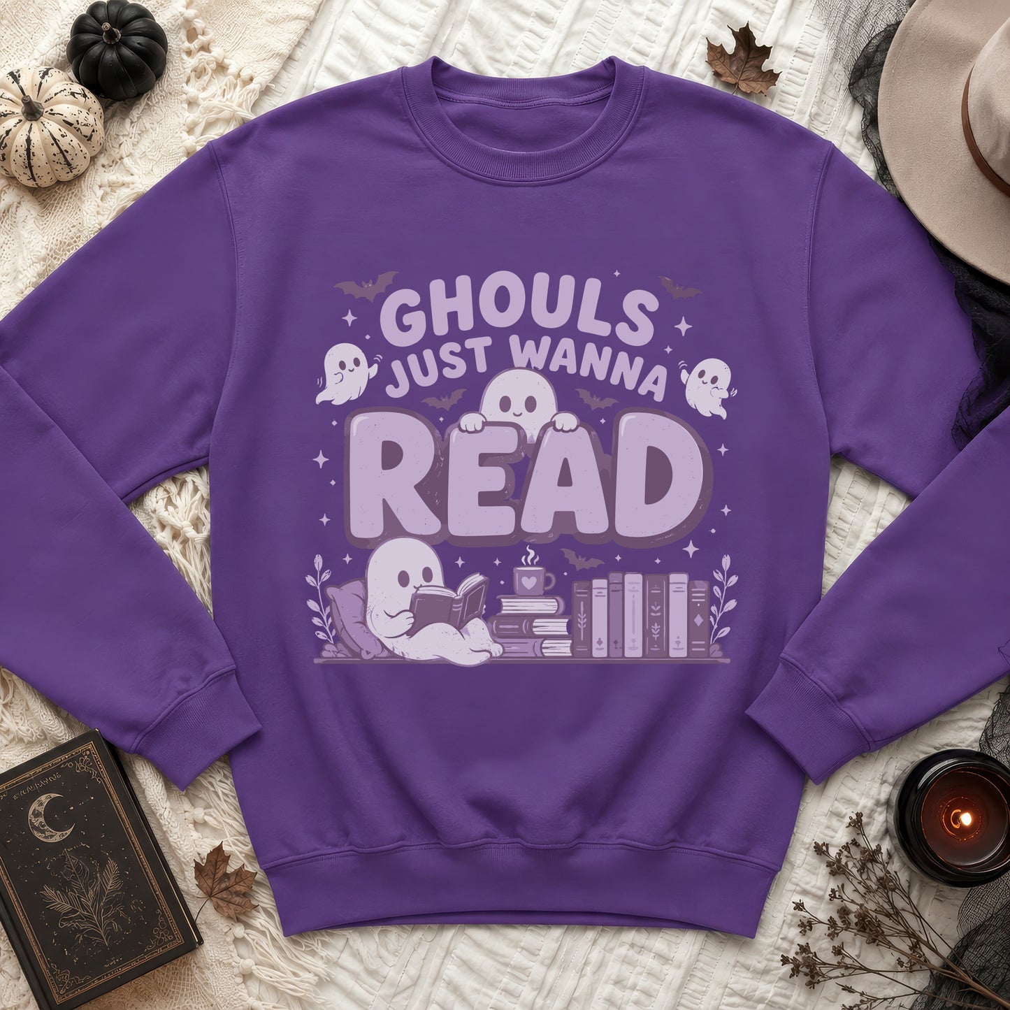 Purple sweatshirt with ghosts reading books and "Ghouls Just Wanna Read" text.