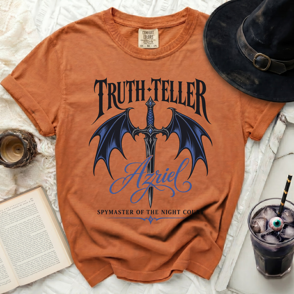 Orange shirt with "TRUTH-TELLER" and "Azriel Spymaster of the Night Court" graphic.