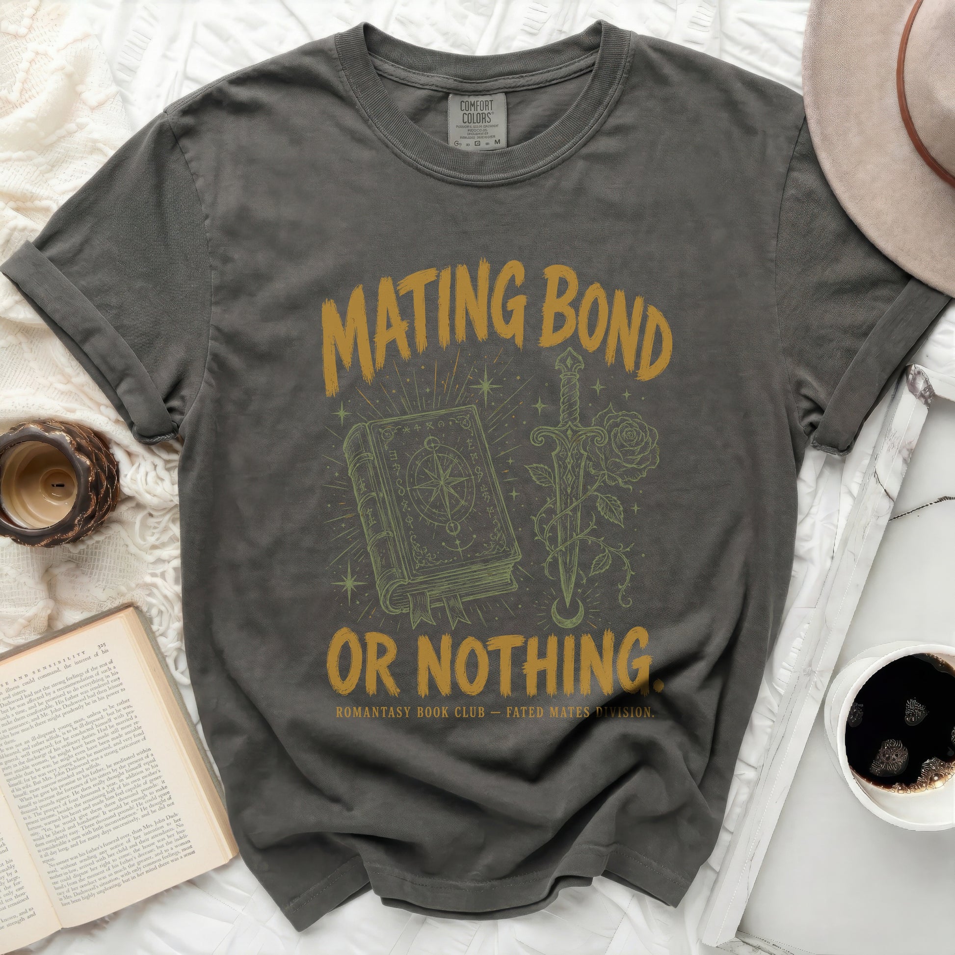 T-shirt with "Mating Bond or Nothing" text, book, sword, and rose.