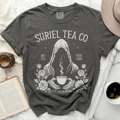 Suriel Tea Co graphic t-shirt with a hooded figure holding a teacup.