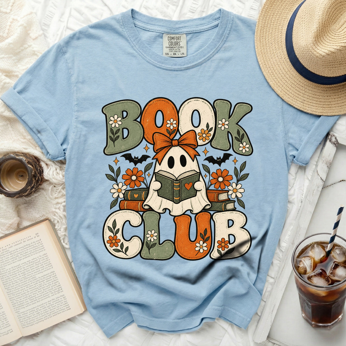 Light blue t-shirt with "Book Club" text and ghost graphic.