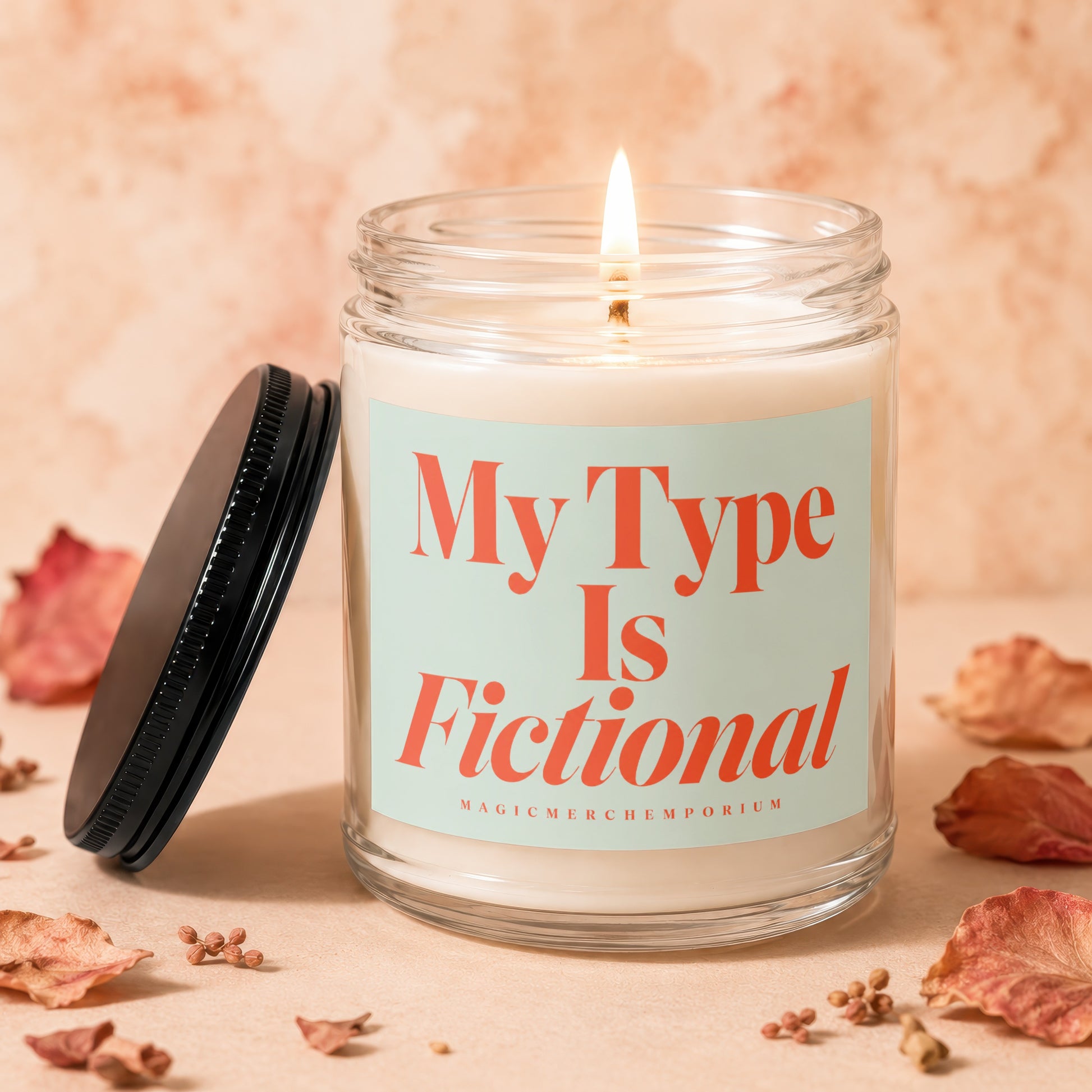 Candle with label "My Type Is Fictional" and MagicMerchEmporium text.