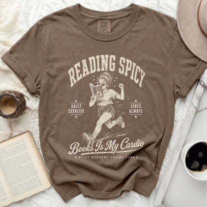 T-shirt graphic with woman running and text "Reading Spicy Books Is My Cardio".