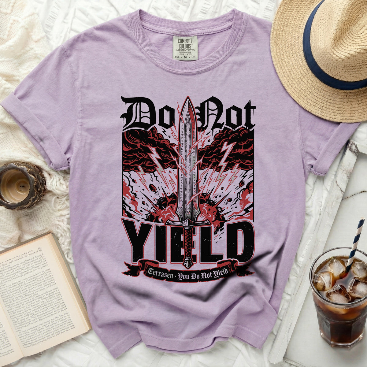 Purple t-shirt with "Do Not Yield" and sword graphic.