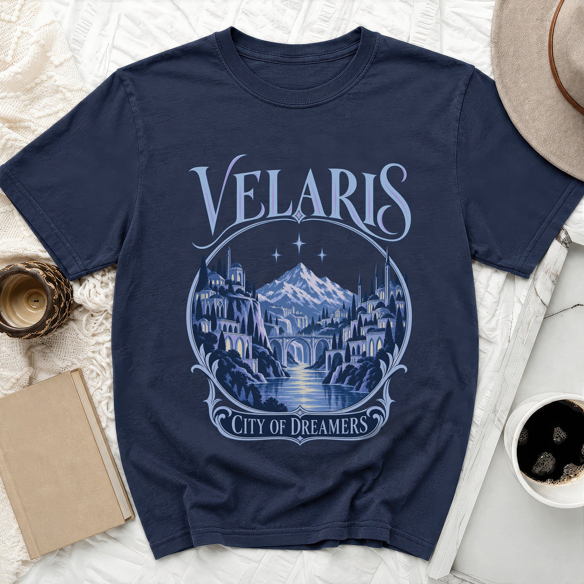 Navy t-shirt with "Velaris City of Dreamers" text and fantasy city graphic.