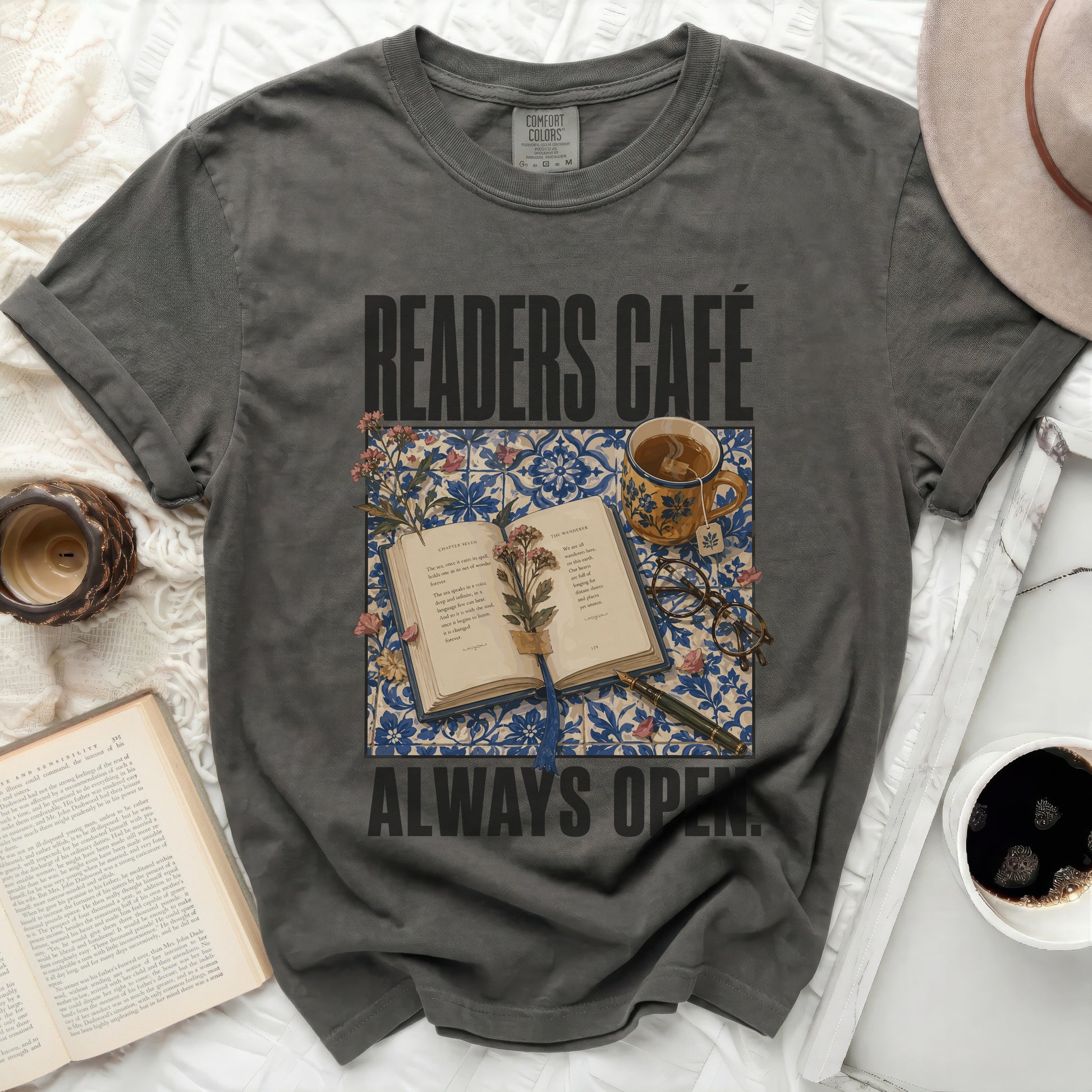 T-shirt with "Readers Café Always Open" and open book graphic.