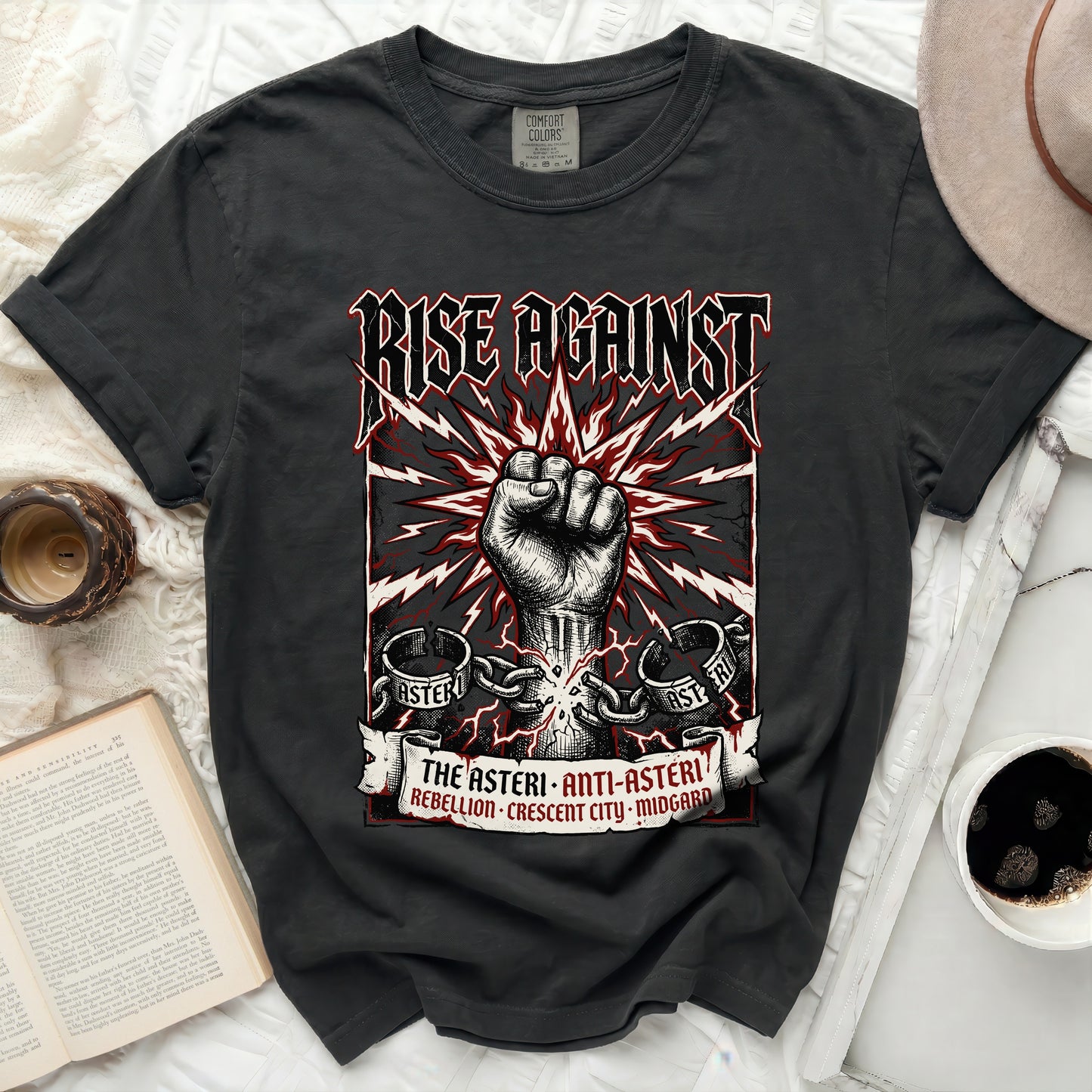 Black t-shirt with "Rise Against" logo, fist, and rebel text.