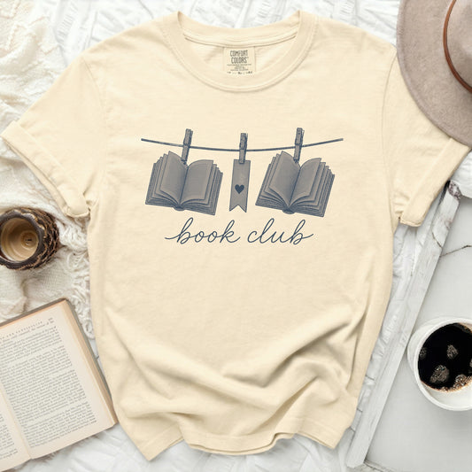 Cream t-shirt with "book club" text and open books graphic.