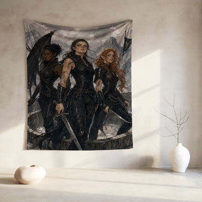 Tapestry shows three women in black armor holding swords with a mountainous background.