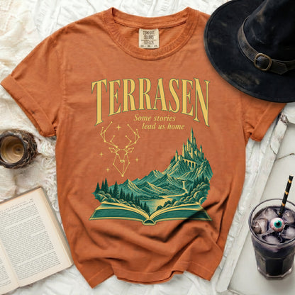 Orange t-shirt with "Terrasen" and a fantasy landscape design.