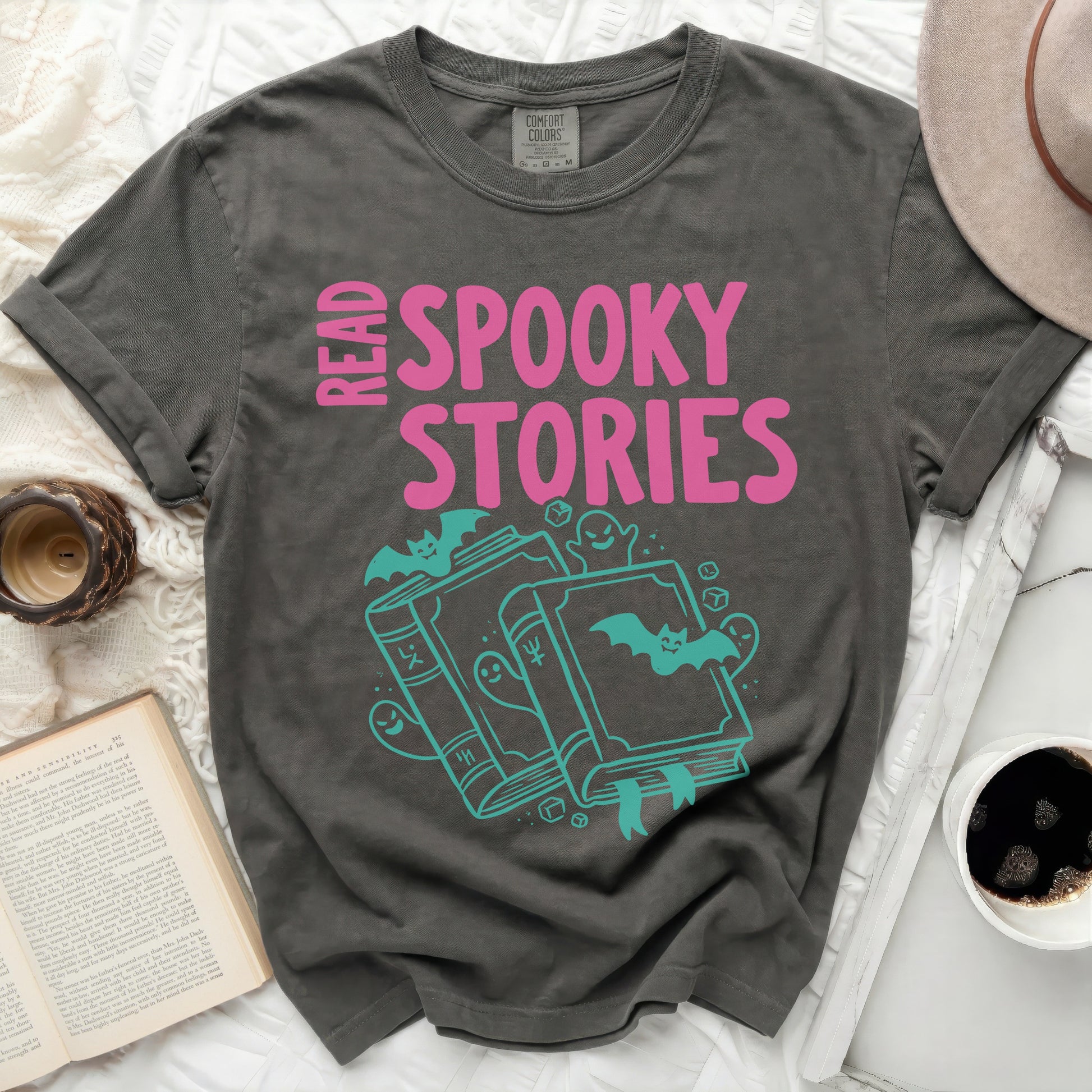 Gray t-shirt with "Read Spooky Stories" text and gothic graphics.