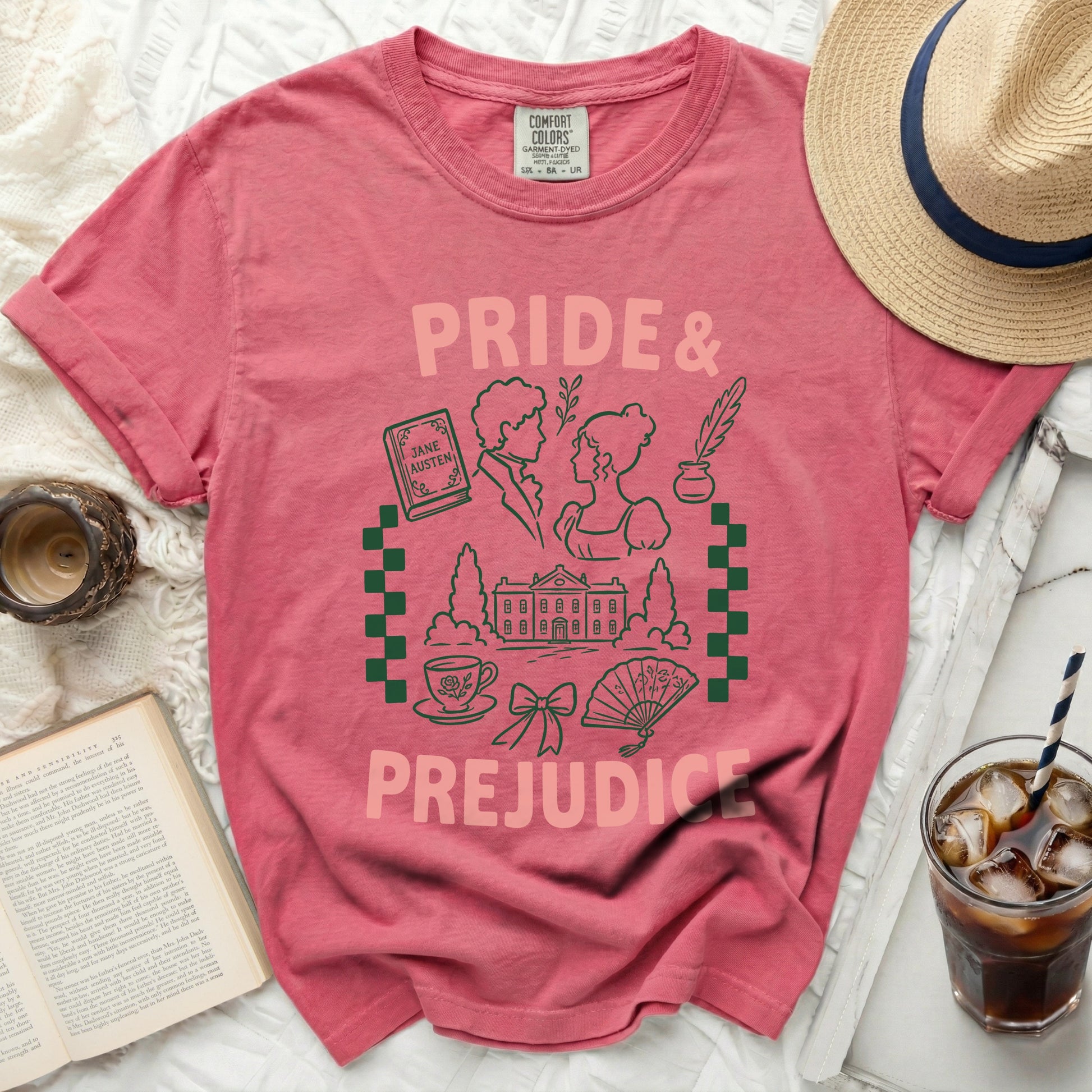 Pink t-shirt with "Pride & Prejudice" design featuring Jane Austen book.