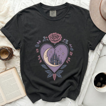 Black t-shirt with a circular pink rose and purple heart graphic.