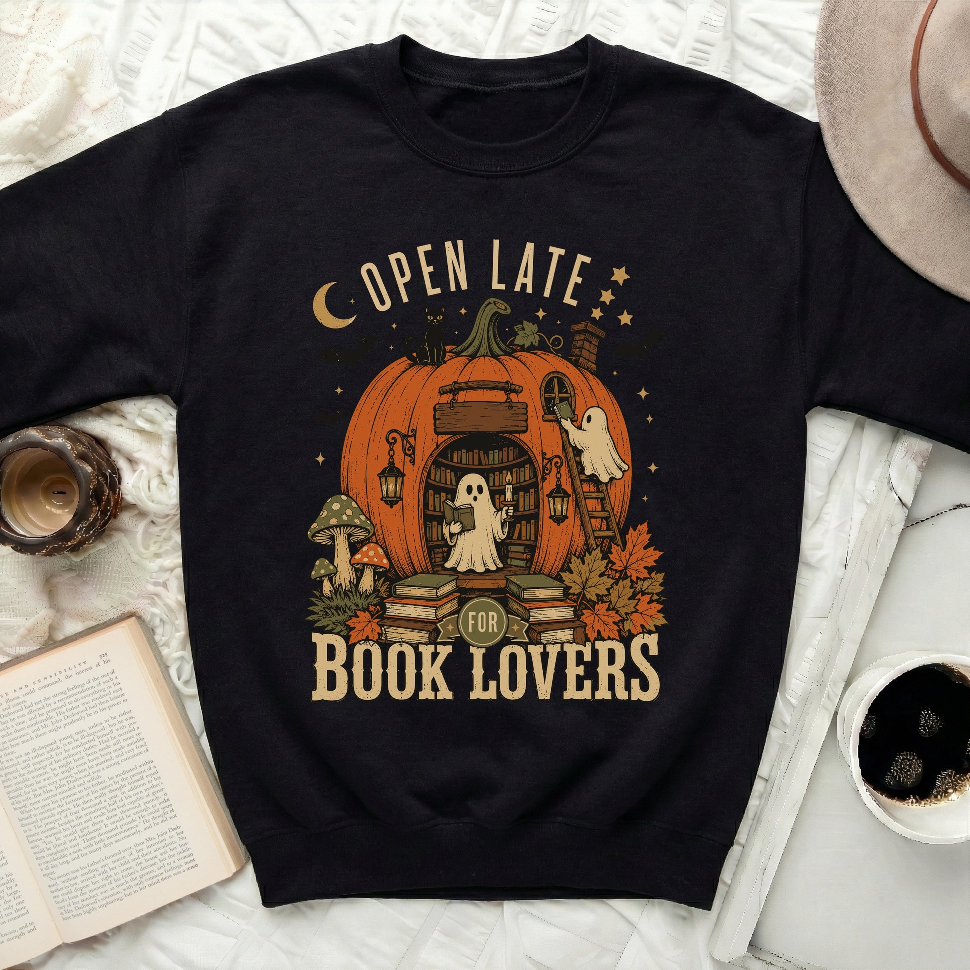 Open Late for Book Lovers graphic on black sweatshirt.