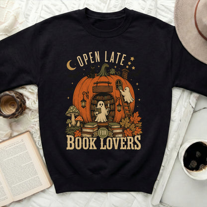 Open Late for Book Lovers graphic on black sweatshirt.