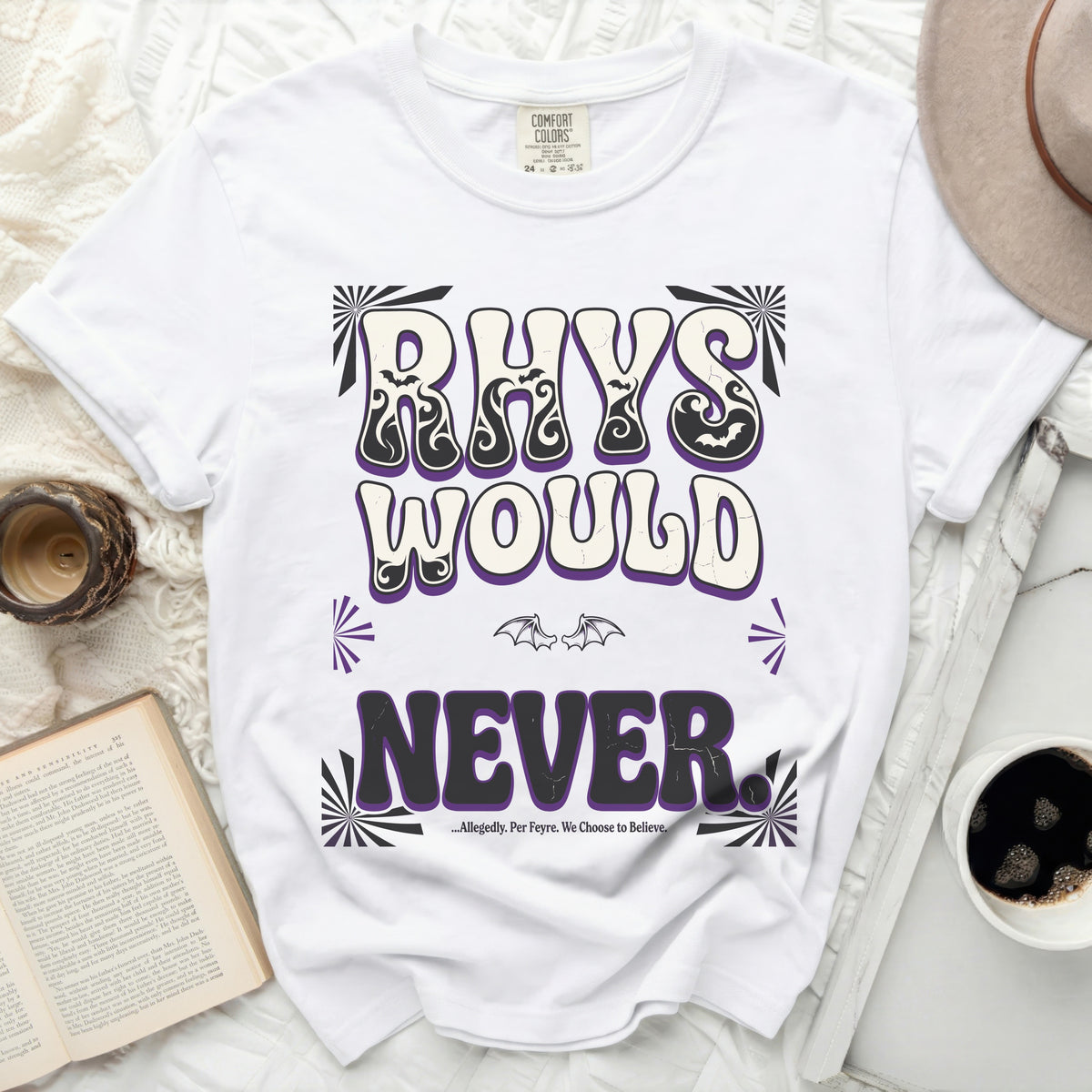 White t-shirt with "RHYS WOULD NEVER" in distressed purple and black text.