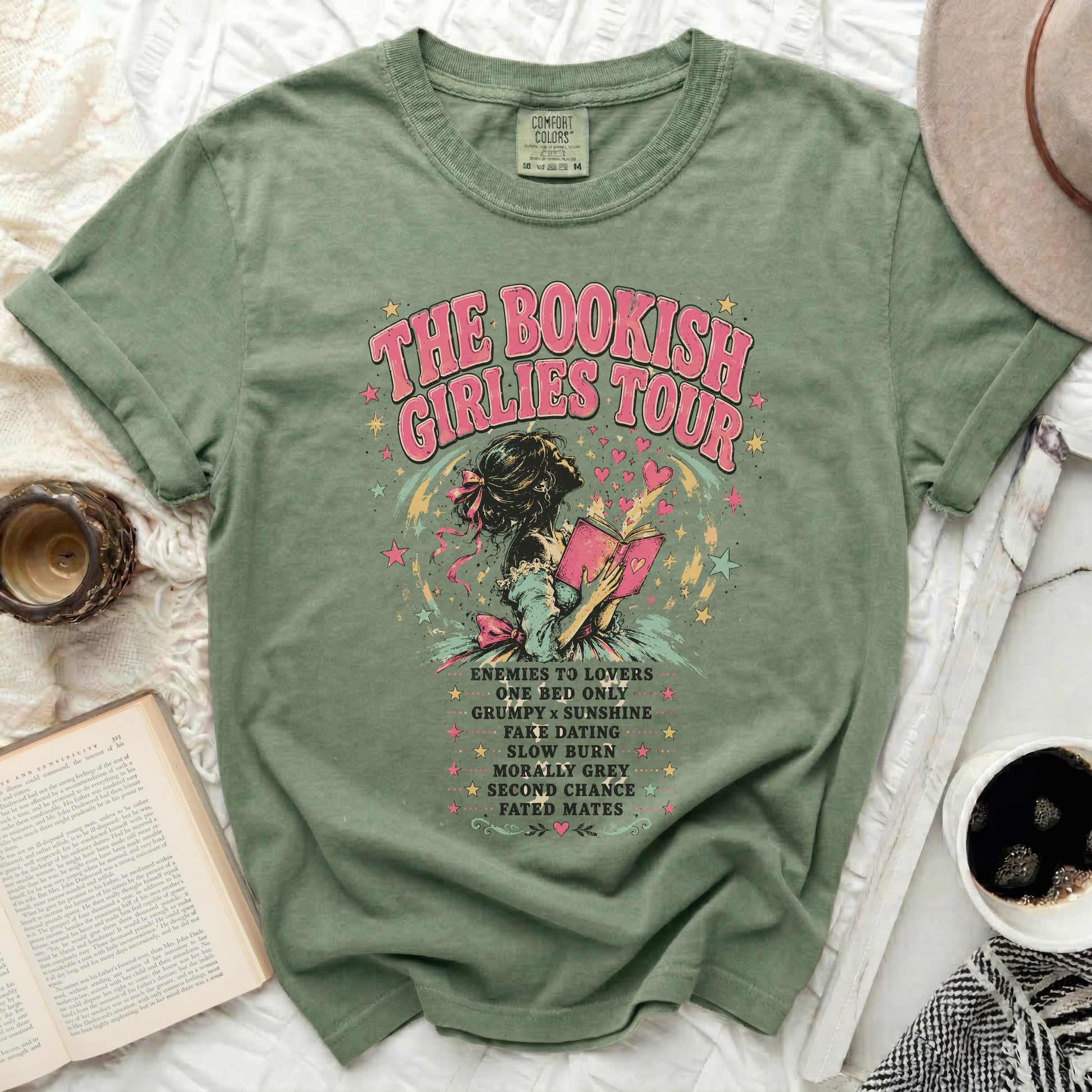 Green t-shirt with "The Bookish Girlies Tour" and romance book tropes.