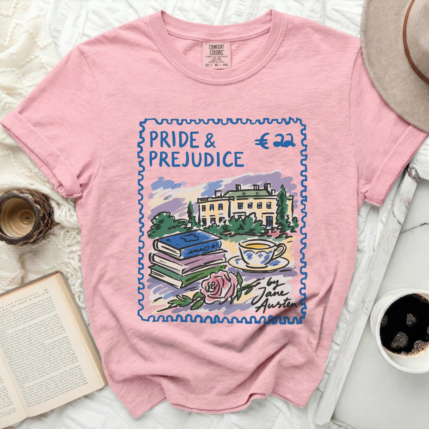 Pink t-shirt with "Pride & Prejudice" stamp design by Jane Austen.