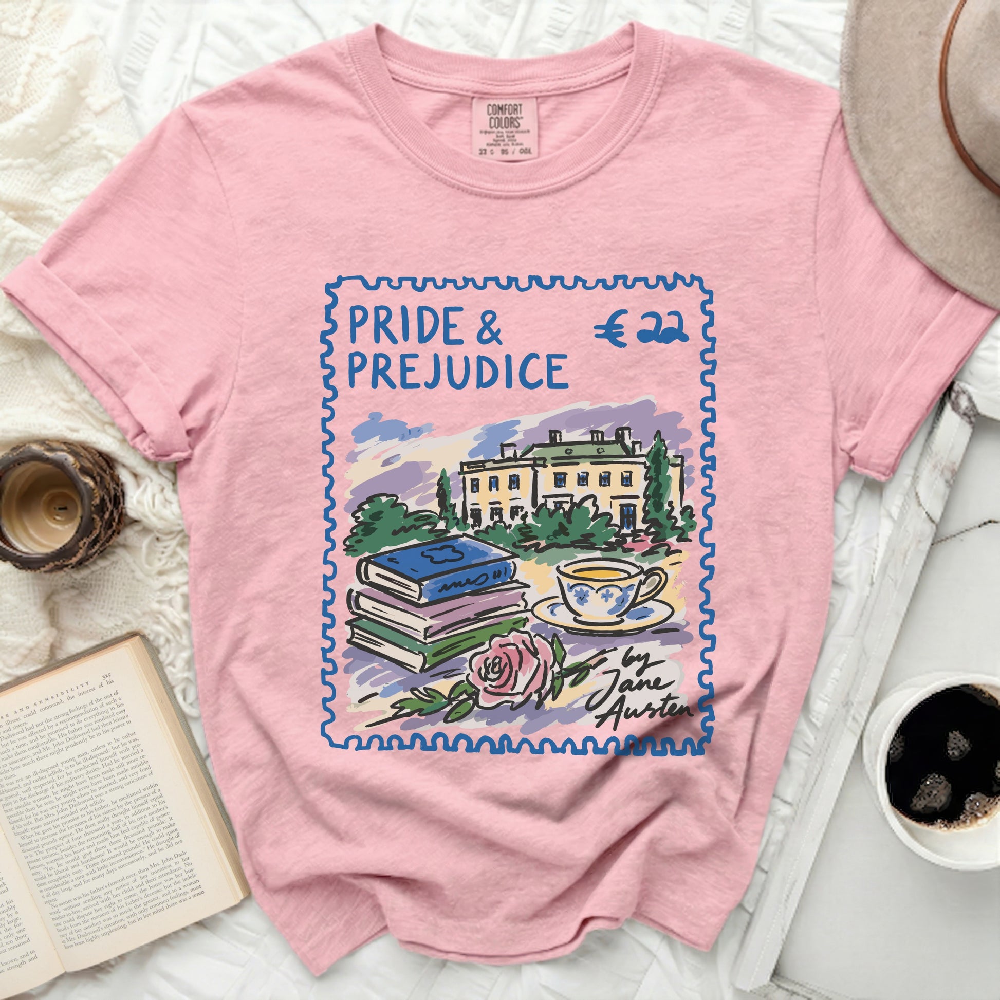 Pink t-shirt with "Pride & Prejudice" stamp design by Jane Austen.