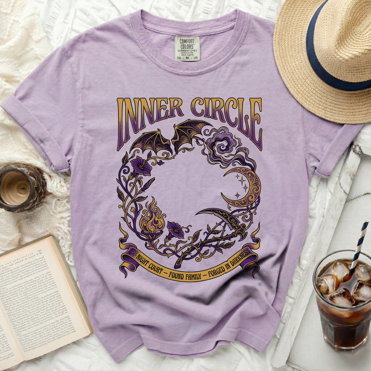Purple t-shirt with "Inner Circle" and celestial gothic graphics.