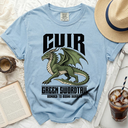 Light blue t-shirt with green dragon graphic and text "CUIR GREEN SWORDTAIL BONDED TO BODHI DURRAN".