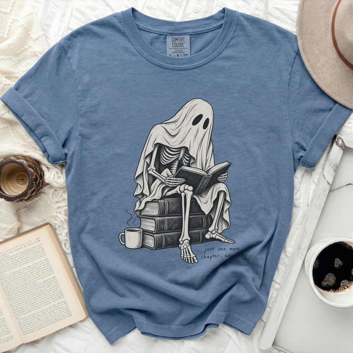 Skeleton ghost reading books, "just one more chapter, apparently."