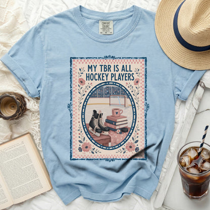 Light blue t-shirt with "MY TBR IS ALL HOCKEY PLAYERS" text and ice hockey scene.