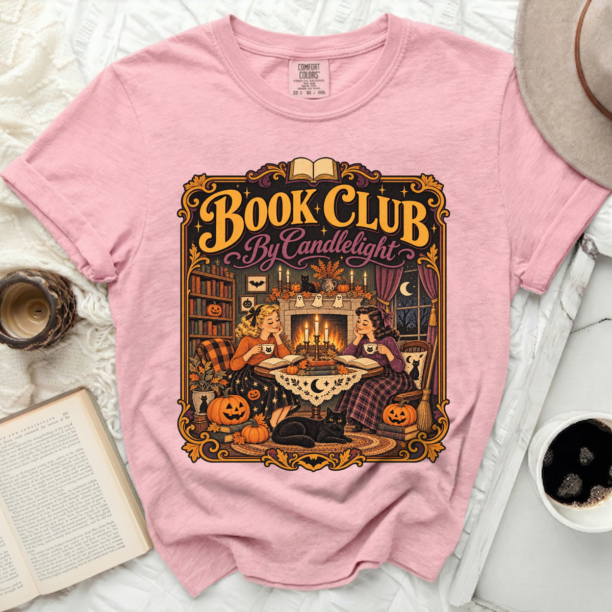 Pink t-shirt with "Book Club By Candlelight" Halloween graphic.