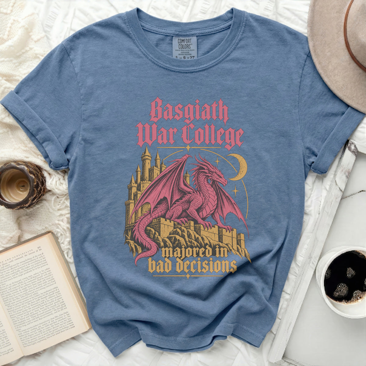Blue t-shirt with pink dragon graphic and "Basgiath War College" text.