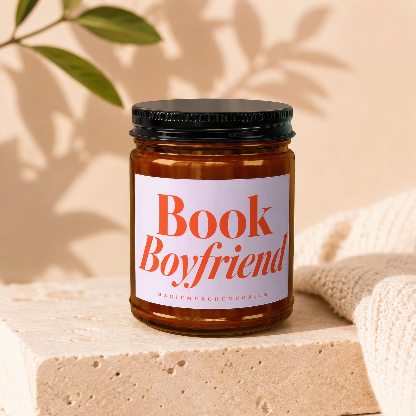 Amber jar candle with "Book Boyfriend" label and "MagicMerchEmporium" text.